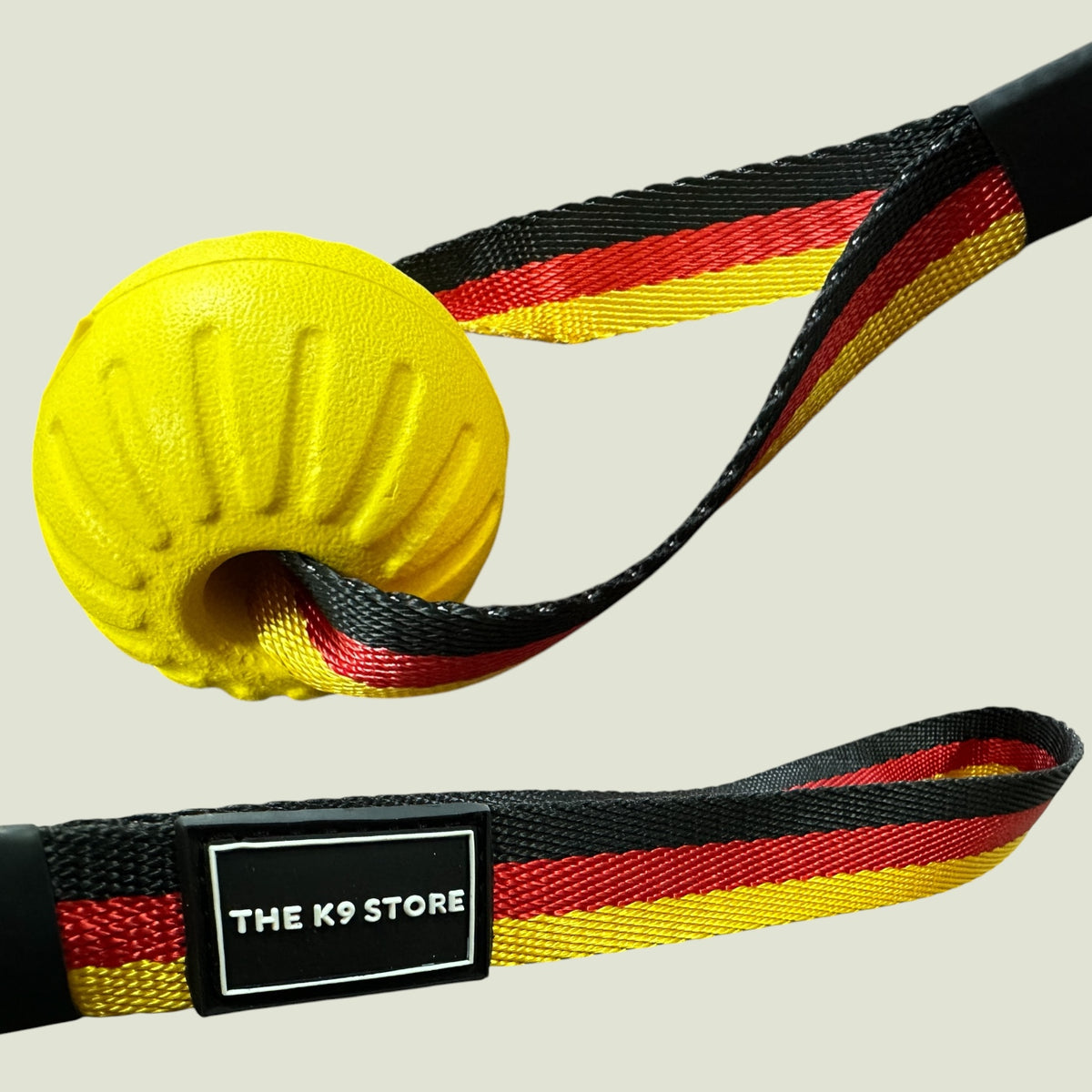 K9 Sport Ball on Rope Dog Toy | Durable Rubber Bite Ball with Handle Strap | Tug, Fetch & Reward Training Toy for Dogs | German Flag Nylon Strap | The K9 Store