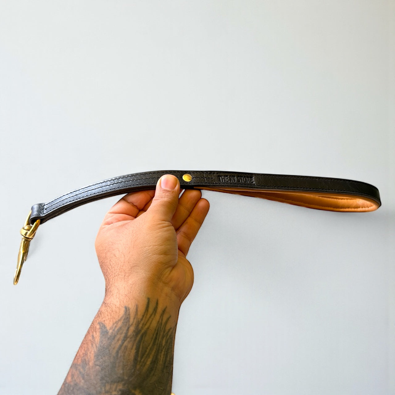 THE K9 STORE Premium 100% Genuine Leather Short Handle for Dogs | Handcrafted 17 Inch Training Leash with Brass Hook | Cushioned Grip | Heavy Duty | 3-Stitched & Hand-Entangled Designs | Tan, Black, Chocolate