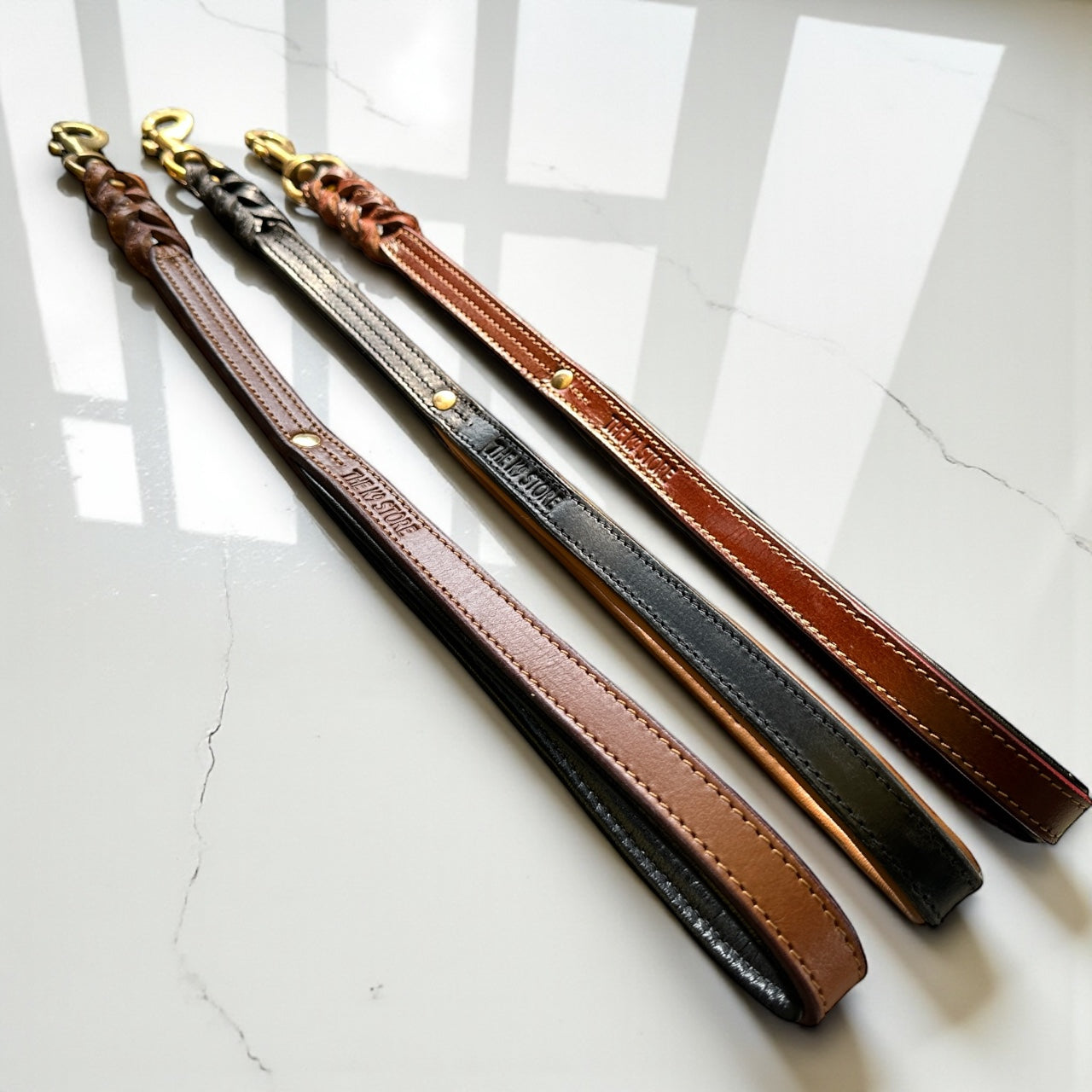 THE K9 STORE Premium 100% Genuine Leather Short Handle for Dogs | Handcrafted 17 Inch Training Leash with Brass Hook | Cushioned Grip | Heavy Duty | 3-Stitched & Hand-Entangled Designs | Tan, Black, Chocolate